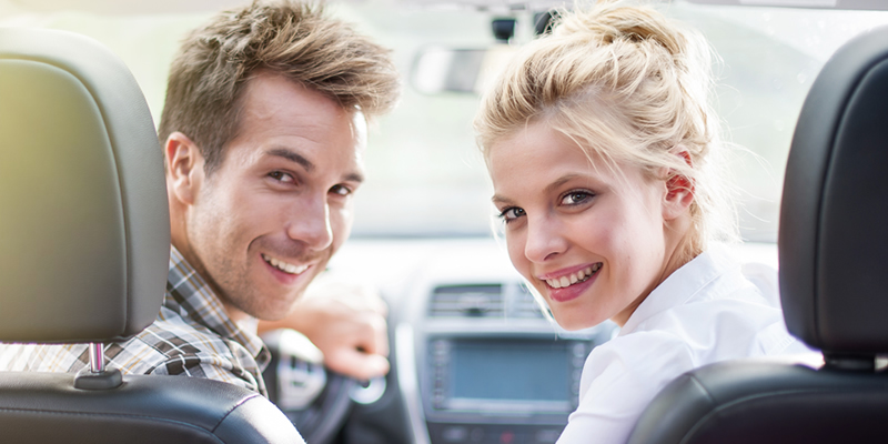 Couple in a new car